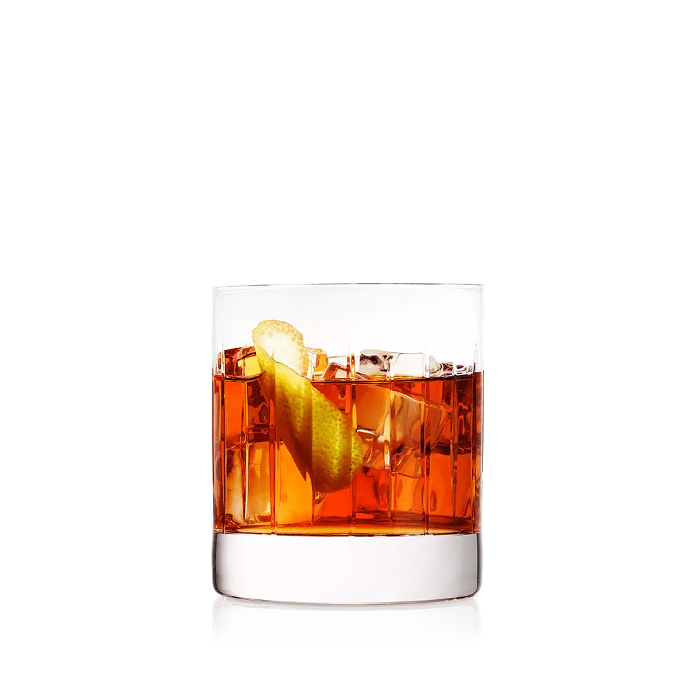 Vieux Carré Cocktail in a short glass with a twist of lemon.